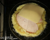 Foto del paso 6 de la receta: Tortilla de papas rellenas de queso y jamón