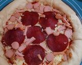 Foto langkah ke 7 dari resep Pizza homemade dengan stuff crust keju.