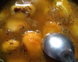 A picture of step 2 of Raw mango lonji.