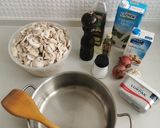 A picture of step 1 of Creamy Mushroom soup, drizzle truffle oil, rustic croutons.