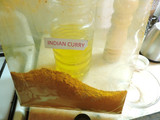Pollo al curry con papas al natural tostadas