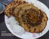 A picture of step 3 of Mooli Parathas.