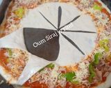 صورة لخطوة 3 من وصفة بيتزا دوار الشمس 🍕 بشكل مختلف 🍕