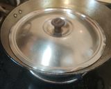 A picture of step 6 of Niramish Aloo Dum.