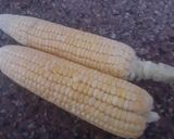 A picture of step 1 of Garma garam saikha hoa bhutta/ corn on the cob In stove flame.