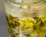 A picture of step 4 of Oyster pickled in Garlic Olive Oil.