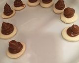 Foto del paso 7 de la receta: Conitos de dulce de leche y alfajores