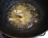 A picture of step 4 of Masala fry sweet potatoes.