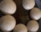 A picture of step 4 of Round doughnuts (Bombolonis).