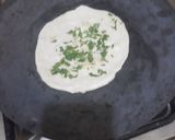 A picture of step 5 of Chicken masala with tawa garlic naan.
