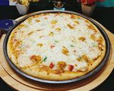 A picture of step 4 of Chicken Pizza 🍕🍕.