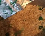 A picture of step 2 of Noodles veggies with Stockfish flakes.