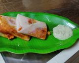 A picture of step 6 of Schezwan Paneer Dosa rolls.