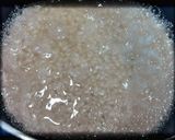 Foto del passaggio 7 della ricetta Risotto Riserva Cascina Alberona con Melanzane, Stracciatella e Guanciale