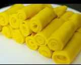 A picture of step 2 of Tadka sesame khandvi.
