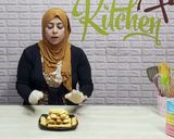 صورة لخطوة 5 من وصفة بسكويت العيد بالبرتقال بالكيس بدون ماكينه
