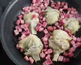 Foto del paso 3 de la receta: Alcachofas con foie, patatas, huevos y jamón