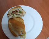 Foto del paso 5 de la receta: Bocadillo de pechuga, lechuga y queso con papas fritas