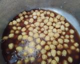 A picture of step 1 of Punjabi Thali - Chana Masala Curry with Methi Masala Puri.