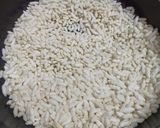 A picture of step 1 of Dhani Makhana Murmura Chivda.