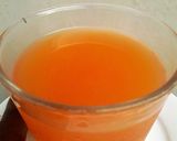 A picture of step 3 of Carrot Detox Juice.