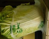 A picture of step 2 of Stir fried Cabbage, green peas, bok choy stuffed Pita bread.