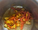 A picture of step 5 of Alu Aur Tamatar Pulao Potato and Tomato Pilaf.