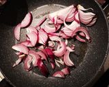 A picture of step 2 of Chicken Breast with Caramelized Red Onions.