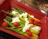A picture of step 7 of Asparagus with burrata in the oven.