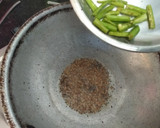 A picture of step 2 of Khatti-Mithi Fried Idlis.