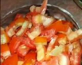 A picture of step 1 of Veggies Oats Khichdi.