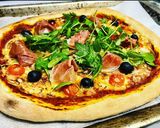 Foto del paso 12 de la receta: Pizza de rúcula y prosciutto con masa madre casera