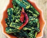 A picture of step 3 of Bhindi Posto.