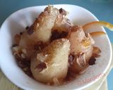 Foto del passaggio 4 della ricetta Pere cotte con marsala, frutta secca e cannella