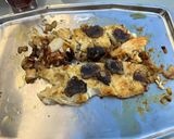 Une image de l'étape 11 de Filets de flétan gratinés à la truffe noire et pesto.