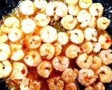 A picture of step 4 of My Garlic & Sweet Chilli prawns on a Wild Rocket bed 🤗.