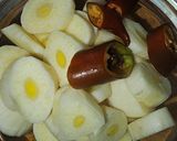 Foto del paso 3 de la receta Patatas confitadas al aroma de langostinos al ajillo