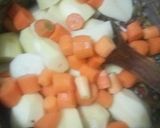 A picture of step 3 of Spicy Potato Curry with Carrots and Peas.