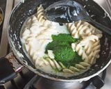 A picture of step 4 of Italian sizzler with spinach, pineapple pasta.
