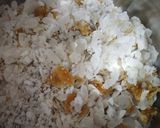 A picture of step 1 of Aval Nanachathu / Sweet Rice Flakes.