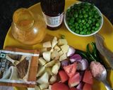 A picture of step 1 of Aloo green peas curry.