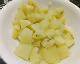 A picture of step 2 of Potatoes with Green Onion.