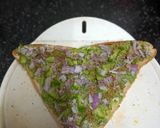 A picture of step 3 of Schezwan Cheese Toast Sandwich (A Mumbai road-side delight).