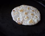 A picture of step 5 of Coconut Poli.