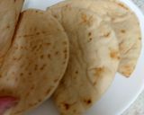 A picture of step 4 of My Salt n Chilli Peppered Chicken on a folded flatbread. 😋.