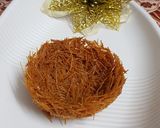 A picture of step 3 of Vermicilli mango rabdi nest.