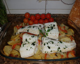 Foto del paso 7 de la receta: Merluza al horno con patatas panaderas