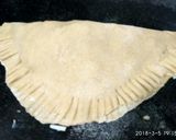 A picture of step 4 of Tava roti pizza.