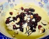 A picture of step 3 of Homemade white chocolate with dry fruits & cranberries.