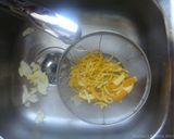 A picture of step 3 of Orange peels- dates and raisins chocolate candy.
